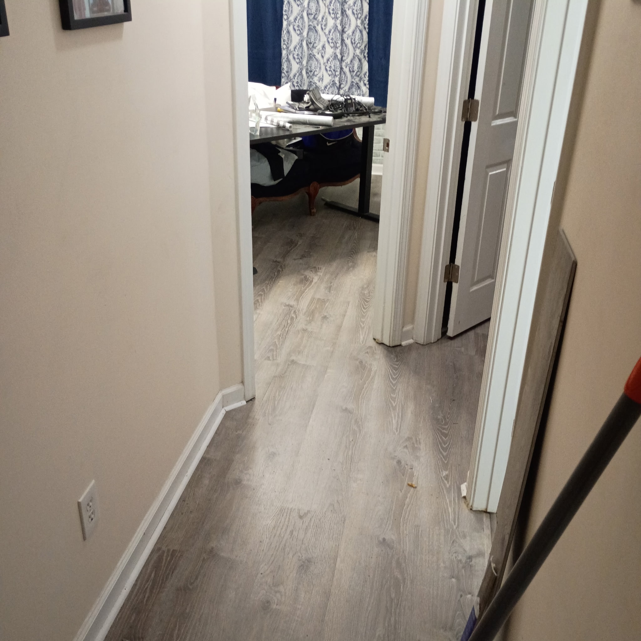 Finished hallway flooring installation